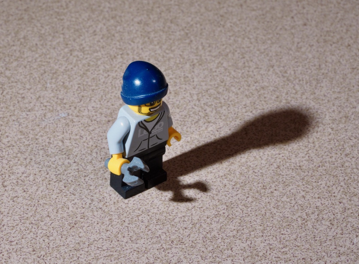 A Lego minifig and its shadow